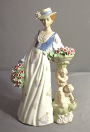 NADAL Porcelain Figurine - Woman With Roses By Birdbath Cherubs