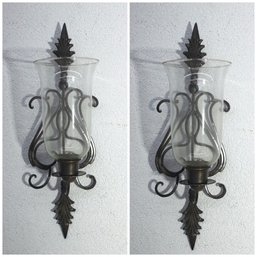 A Pair Of Wrought Iron And Glass Chimney Wall Mount Candle Sconces