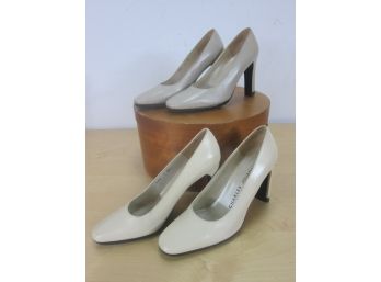 Pair Of White And Off White Charles Jourdan Shoes