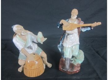 Pair Of Mud Man Figurines
