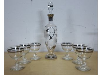 Clear Glass Decanter And Wine Glasses With Silver Overlay.