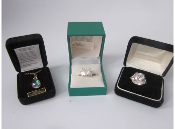 Two Costume Rings And Crystal Pendant Necklace