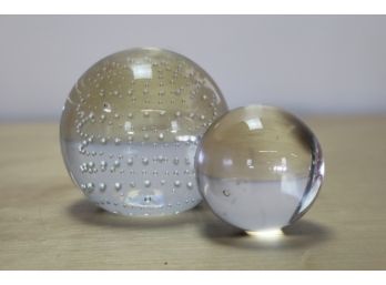 2 Clear Glass Paperweights