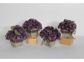 Four  Small Decorative Flowers