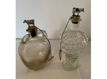 Pair Of Vintage Bottles With Cow Stoppers