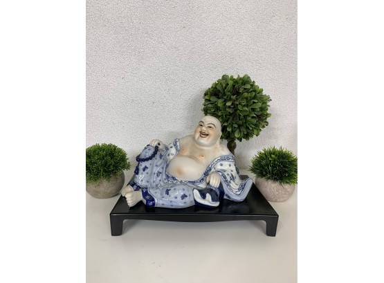 Blue & White Oriental Laughing Buddha On A Wooden Stand