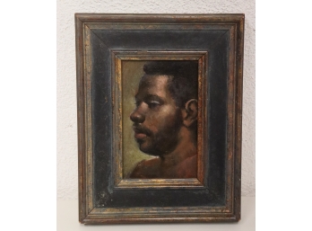 Small Framed Artwork Of A Man