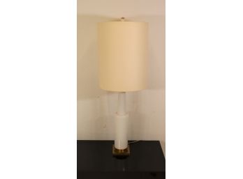 Tall Modern White Glass Lamp On A Heavy Brass Base