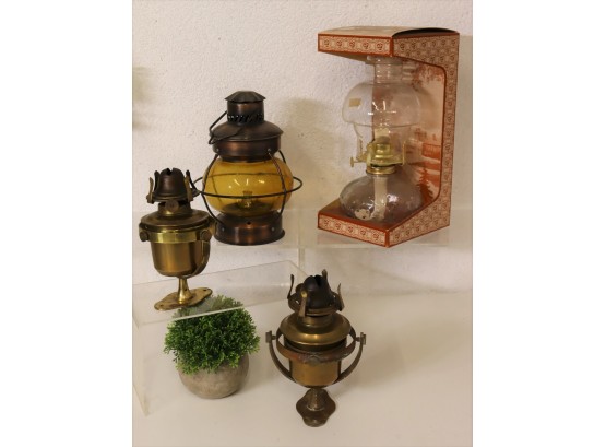 Group Of Oil Lamps - 2 Brass Lamps With Gyroscopic Fastener Stands And 1 Clear Hooded And 1 Amber Globe