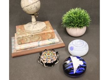 Three Paperweights