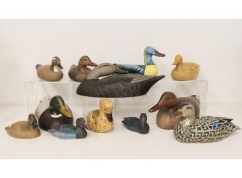 A Dozen Carved Wooden Duck Decoys - Smalls, Mediums, And Larges