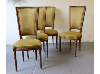 Four Upholstered Sway Back Dining Chairs