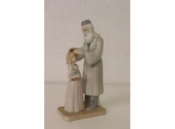 Porcelain Figure Of A Rabbi And Child