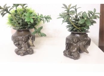Pair Of Decorative Cast Small Planters Adorned With Reclined Figurines