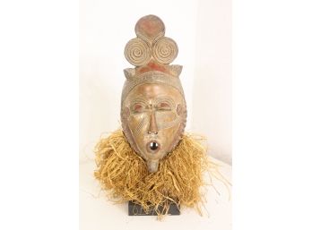 Fancy Helmet Warrior With Raffia Neck Piece Carved Mask -On Stand (included)