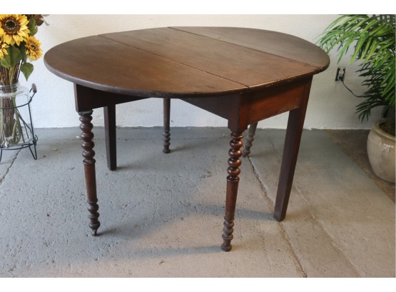 Oval Drop Leaf Expandable Table With Spindle & Column Turned Legs