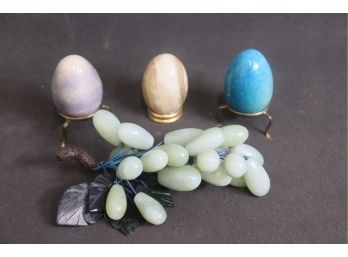 Curious Lot Of Colored Marble Eggs On Brass Bases And Grape Bunch With Leaves  Stems