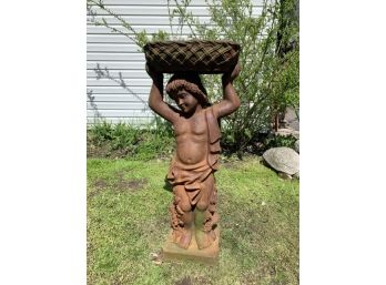 Formed Cast  Planter Of A Boy Holding A Basket
