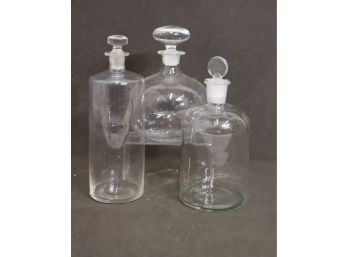 Less Is More: Three Glass Decanters With Finials In Matching Shapes