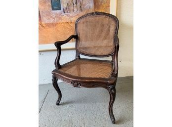 Cane Seat Open Arm Chair , Carved