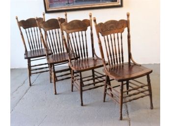 Four Turned Spindle Windsor Side Chairs With Carved Panel And Nailhead Seats