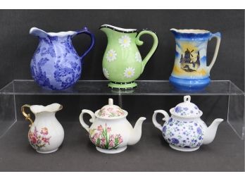 Pitchers And Teapots Lot: 2 Flower Decorated Tea Pots And 4 Colorful Pitchers
