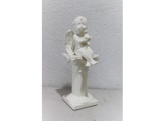 Winged Cherub Holding Dove Figurine - White Glazed Ceramic