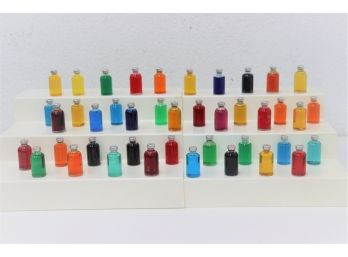 42 Glass Ampules Filled With Assorted Colored Liquid