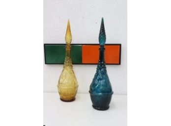 Pair Of Dramatic Fruit Basket Art Glass Bottles In Blue And Amber (bottom Of Blue Stopper Is Chipped)