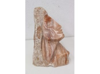 Carved Head In Pink Stone