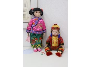 Two Porcelain Baby Dolls In Traditional Asian Dress - One Is William Tung Collection