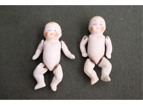 Two Vintage Metal Jointed Bisque Baby Dolls