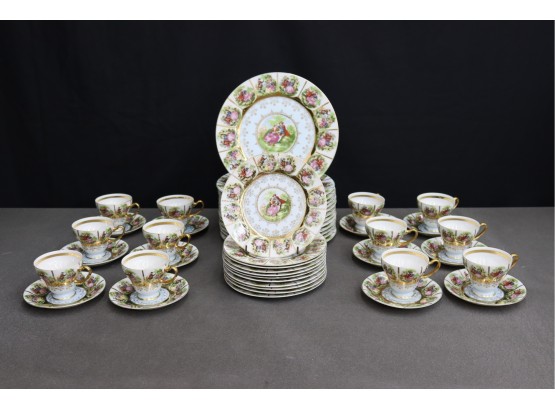 Ample Sophisticated Porcelain Lot - Arnart  Fragonard Love Scenes 12 Teacups, 12 Saucers, 24 Dessert Plates