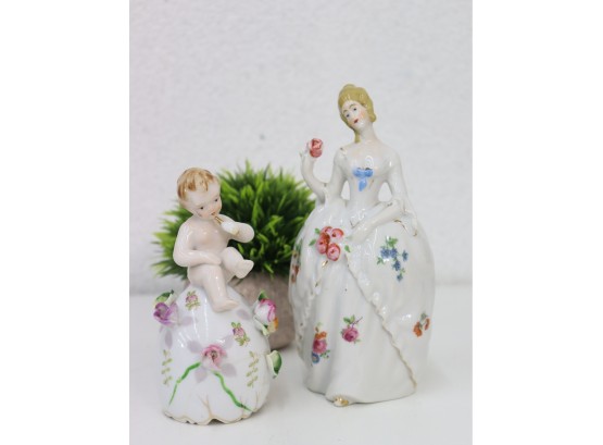 Fine Pair Of Painted Porcelain Figurines - Baby Bell And Lady Of The Court