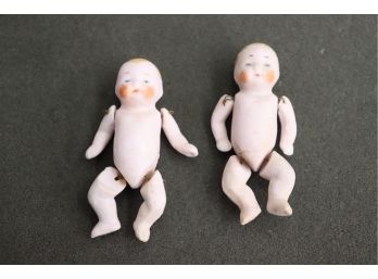 Two Vintage Metal Jointed Bisque Baby Dolls