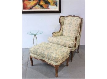 Upholstered Carved Frame Wing Back Chair And Matching Ottoman