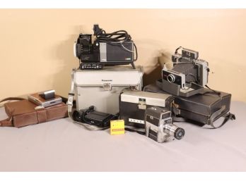 Group Assemby Of Vintage Polaroid Cameras And Vintage Movie Cameras