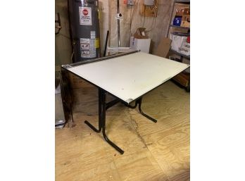 Drafting Table With Parallel Straight Edge Ruler Bar And A T-Square