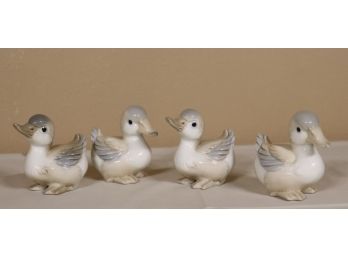 Four Duckling Porcelain Figurines