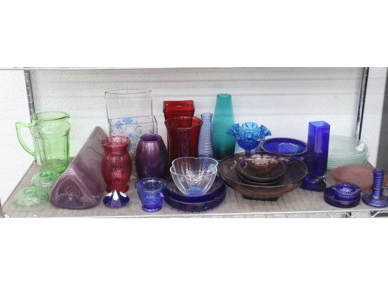 Shelf Lot Of Shapely And Colorful Glass Vessels