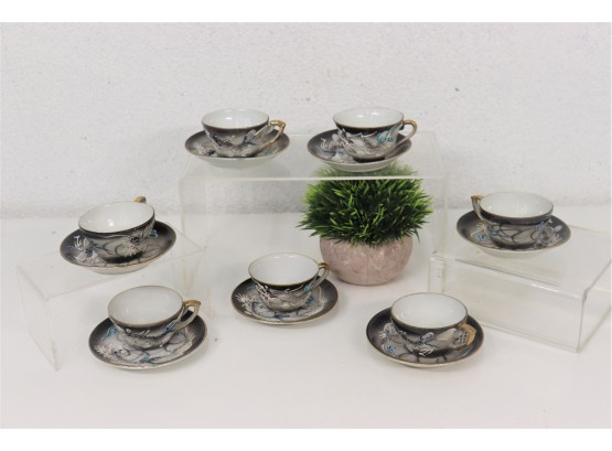 Highly Decorated Porcelain: Seven Cups And Seven Saucers From Japan