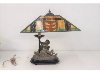 Stained Glass Polygon Cantilever Shade On Dragonfly Cherub Figural Lamp