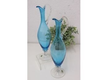 MCM Pair Of Celeste Blue Balboa Venetian Glass Slender Pedestal Pitchers - Twisted Glass Handle And Base