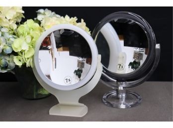 A Pair Of Round Lucite Tilting Make-Up Mirrors - 1 Is Frosted Translucent And 1 Is Clear