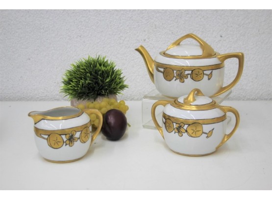Striking Lotus Root And Flower Gold Painted Porcelain Teapot , Creamer And Sugar