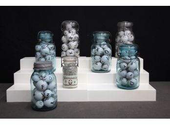 Vintage Preserving Jars Filled With Letter Orbs, And One Full Of Shredded US Currency