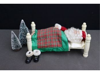 Sleepy Santa In Bed With Boots On Floor