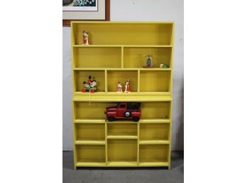 Two Yellow Stacked Montessori-style Shelves