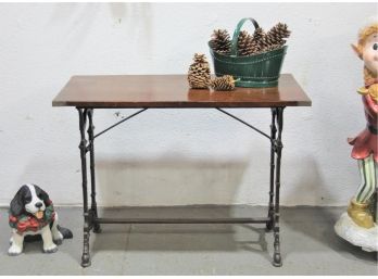 Plant Top Table With Iron Base And Brass Conners. Good Quality. Ware Consistent With Use