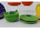 Group Of Varied Colorful Fruit Shaped Plates And Bowls With Matching Fruit Spoons